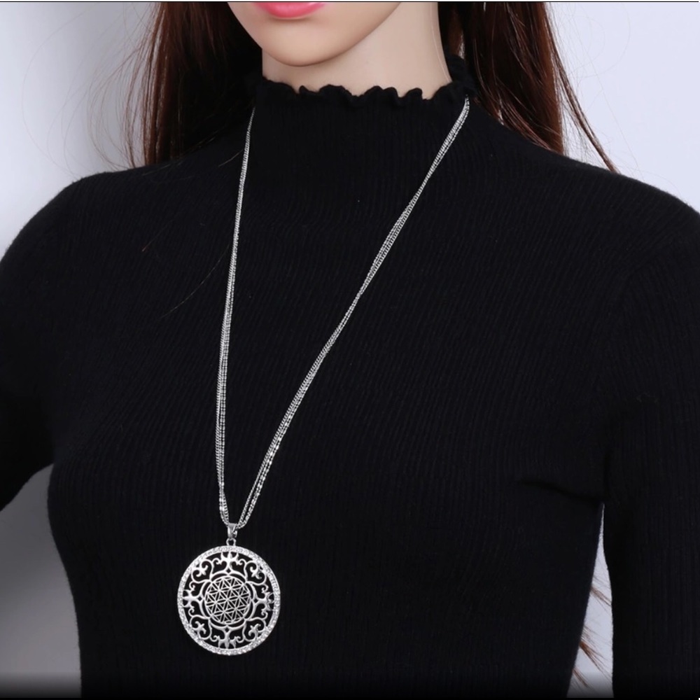 Long necklace with Lucky Sun Pendant.
